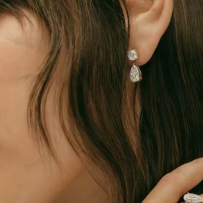 Couture Brilliant Pear Earring-Medium Infinity Hoop Earrings in 18k gold plated stainless steel. Lightweight, non-tarnish and waterproof everyday hoops. A perfect daily wear gold earring.-Dazzledvenus