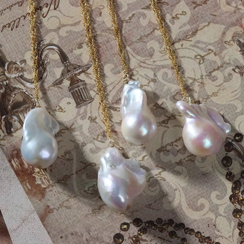 Regal Baroque Pearl Necklace-Embrace celestial beauty with our Sun & Moon Baroque Pearl Necklace. Embrace the beauty of transformation. Shop now for a touch of elegance. 🏆-Dazzledvenus