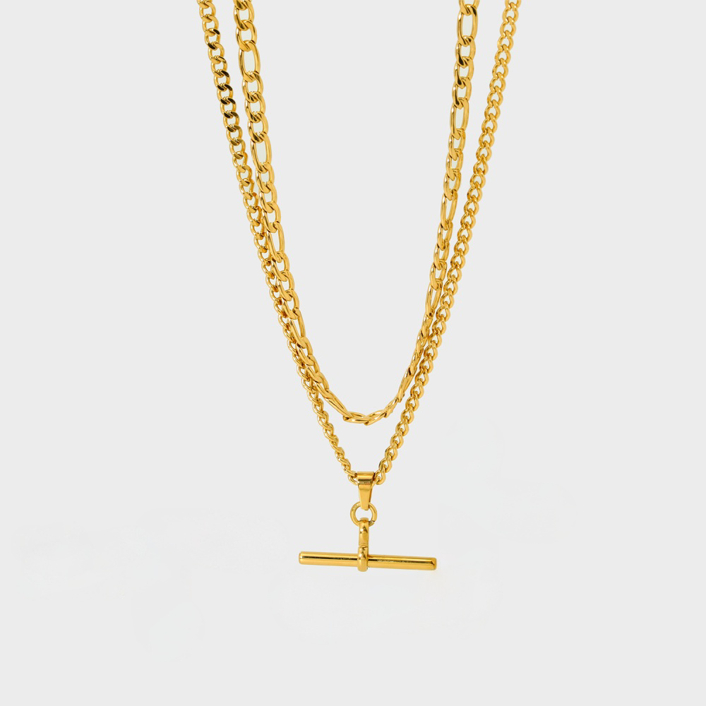 Multilayered T Bar Necklace-Elevate your style with our multilayered Figaro chain T-bar necklace, available in luxurious gold and sleek silver. This elegant piece features alternating long and short links with a chic T-bar clasp for a modern twist on a classic design.

Crafted with 18k gold plating, it boasts a radiant, durable finish and is waterproof, ensuring lasting beauty and practicality. Enjoy free worldwide shipping and shop with confidence thanks to our 30-day satisfaction guarantee. Redefine sophi