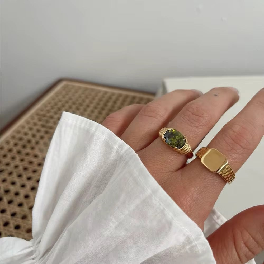 Emerald Isle Signet Ring-Elegant Emerald Isle Signet Ring featuring a vibrant green stone. Gold-plated,waterproof, tarnish-free and hypoallergenic. Inspired by the beauty of Ireland.-Dazzledvenus